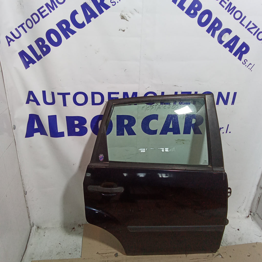 portón trasero derecho completo Ford Fiesta año 2002