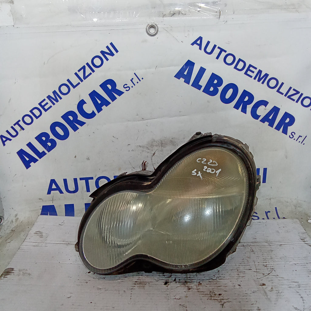 Faro delantero izquierdo Mercedes C220 año 2001