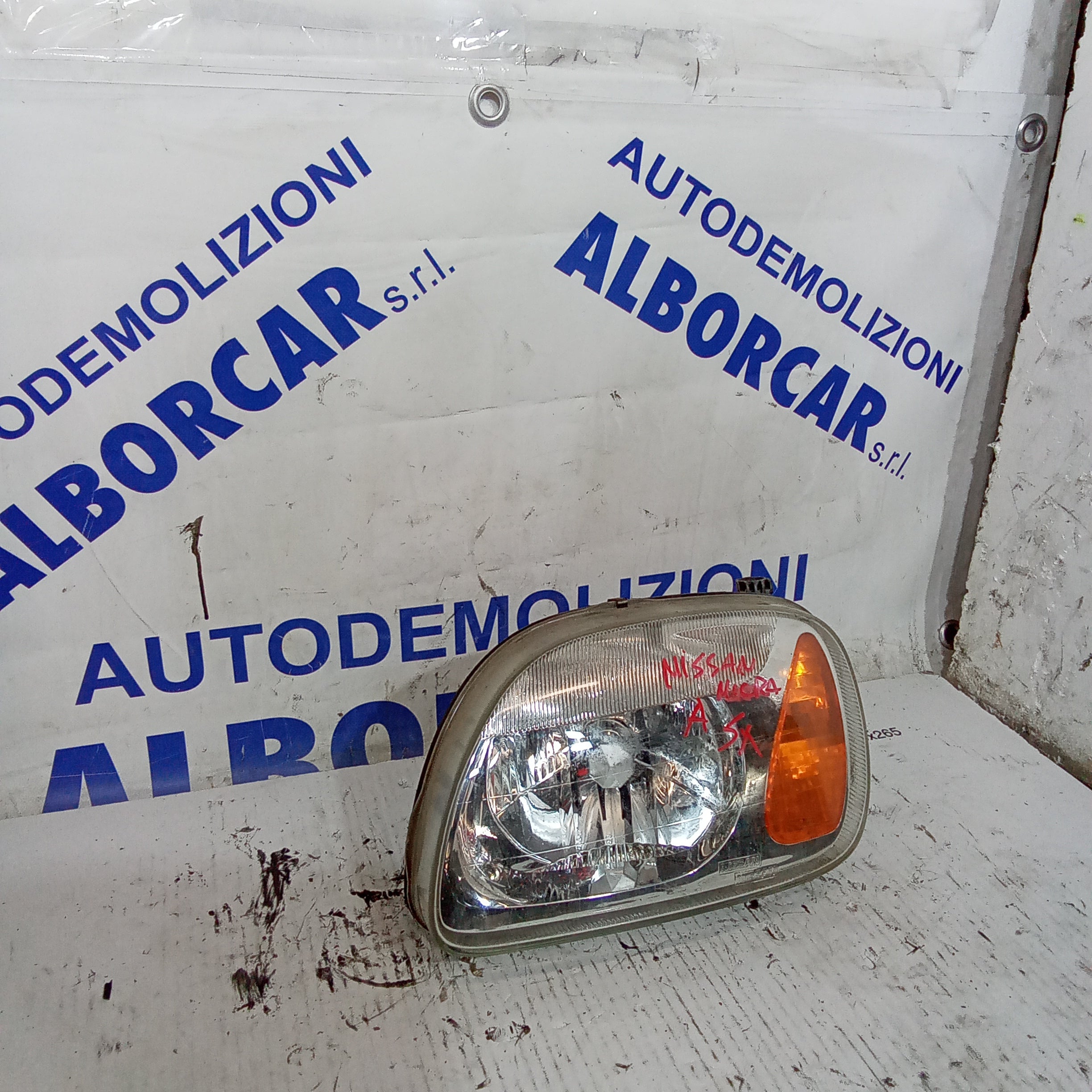 faro delantero izquierdo Nissan Micra año 2001