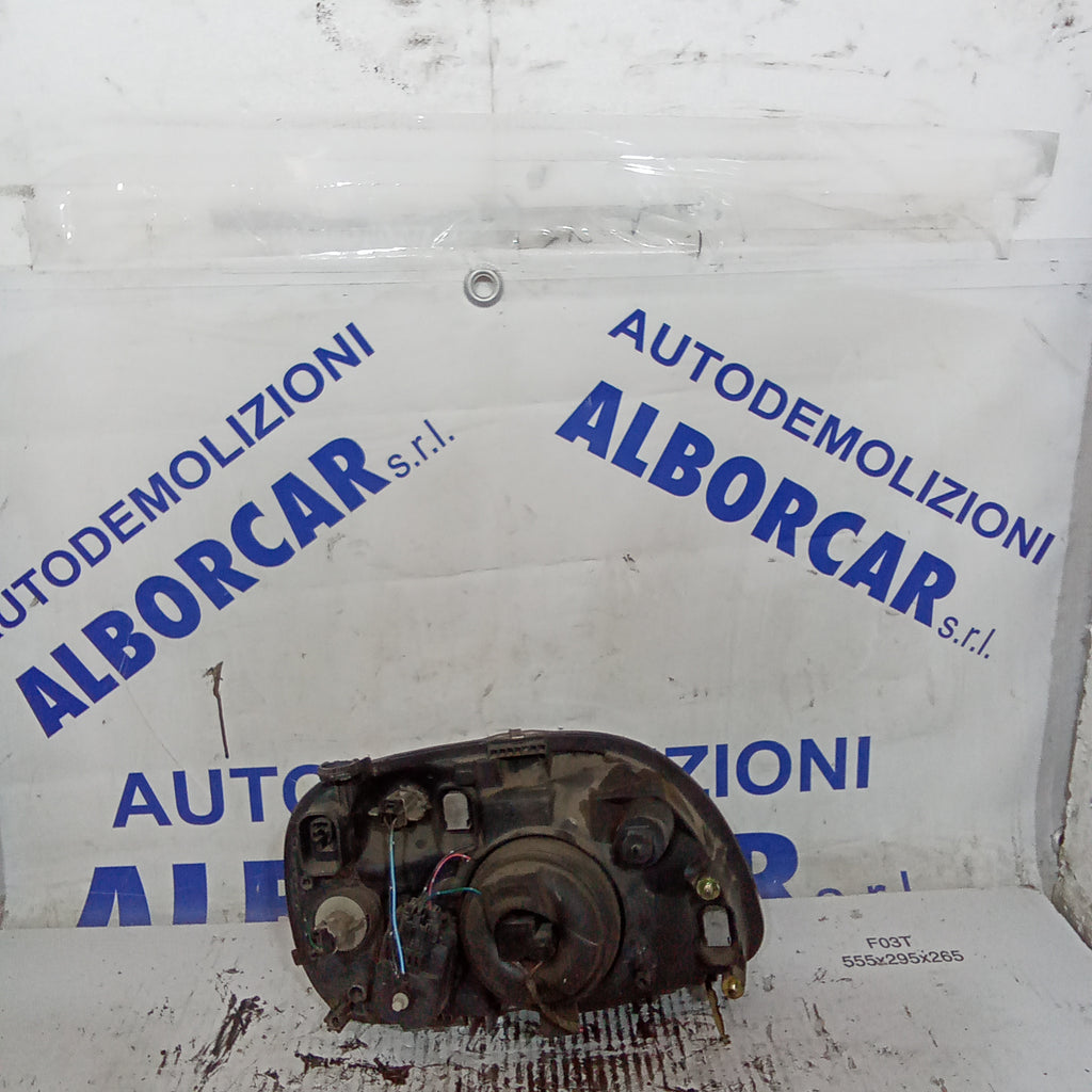 faro delantero izquierdo Nissan Micra año 2001