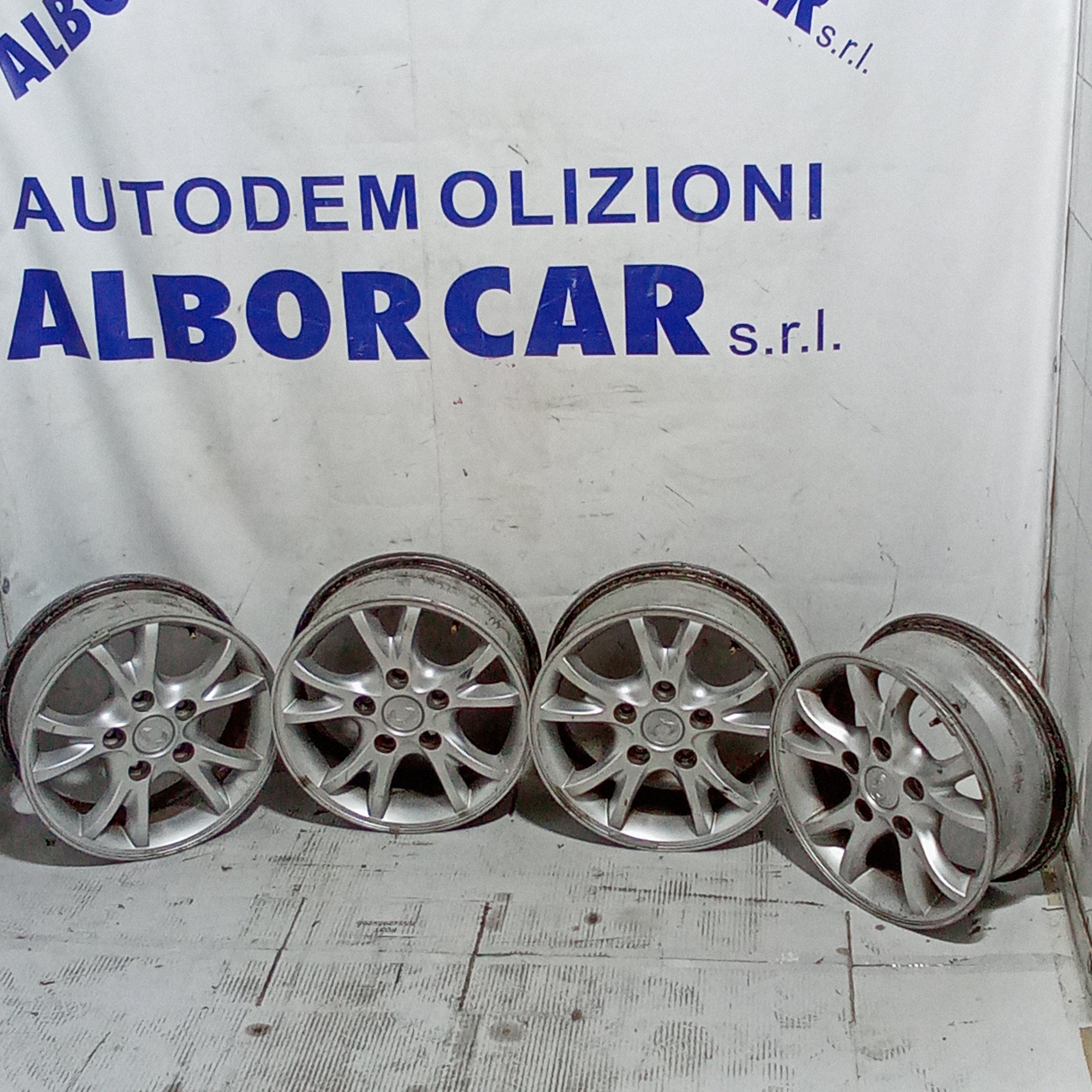 4 cerchi in lega ssangyong 5 fori 16 pollici