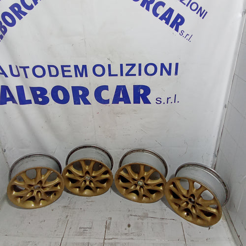 4 Alfa Romeo GT alloy wheels 5 holes 15 inch