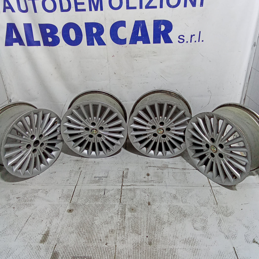 4 cerchi in lega alfa 159  5 fori 17 pollici