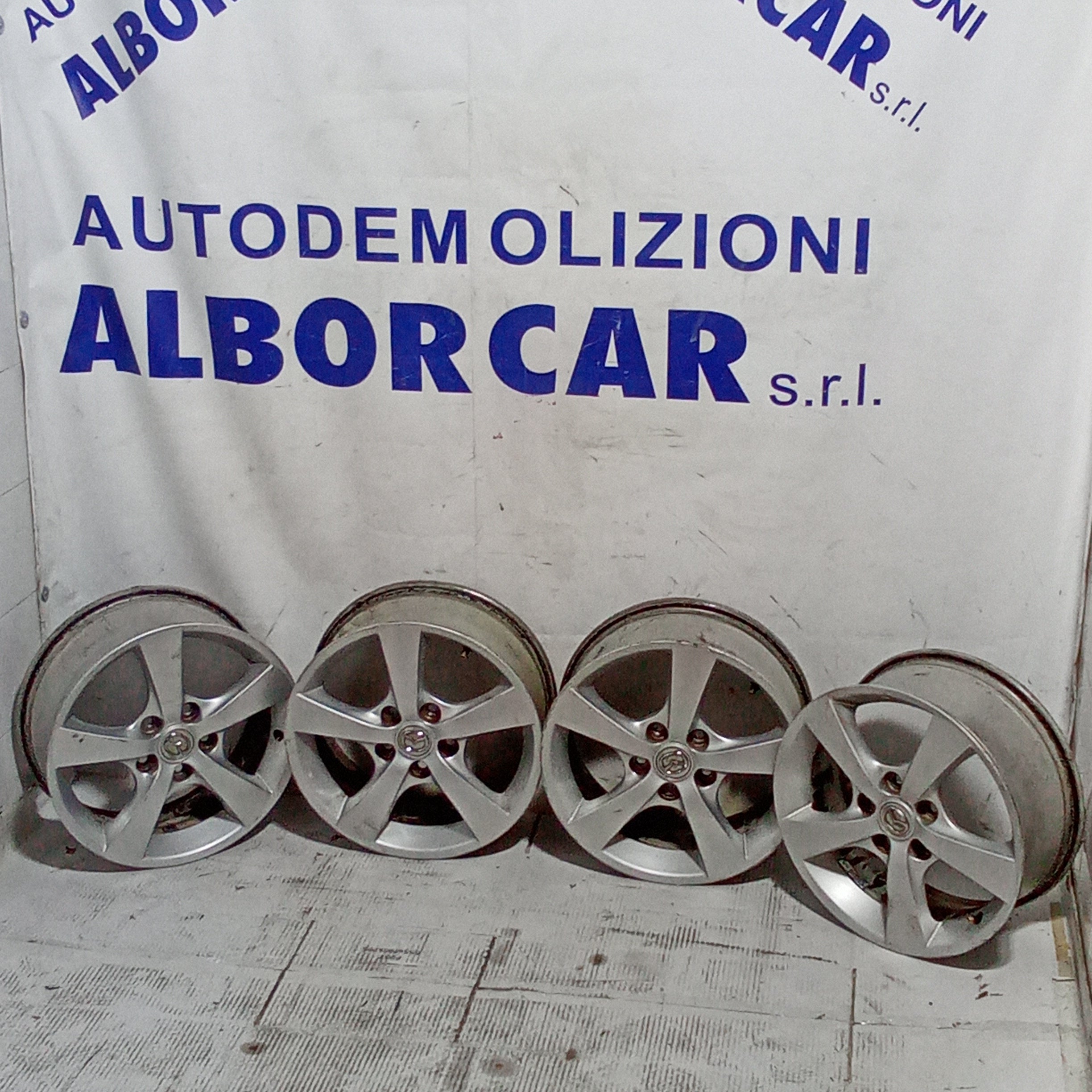 4 cerchi in lega mazda3  5 fori 16 pollici