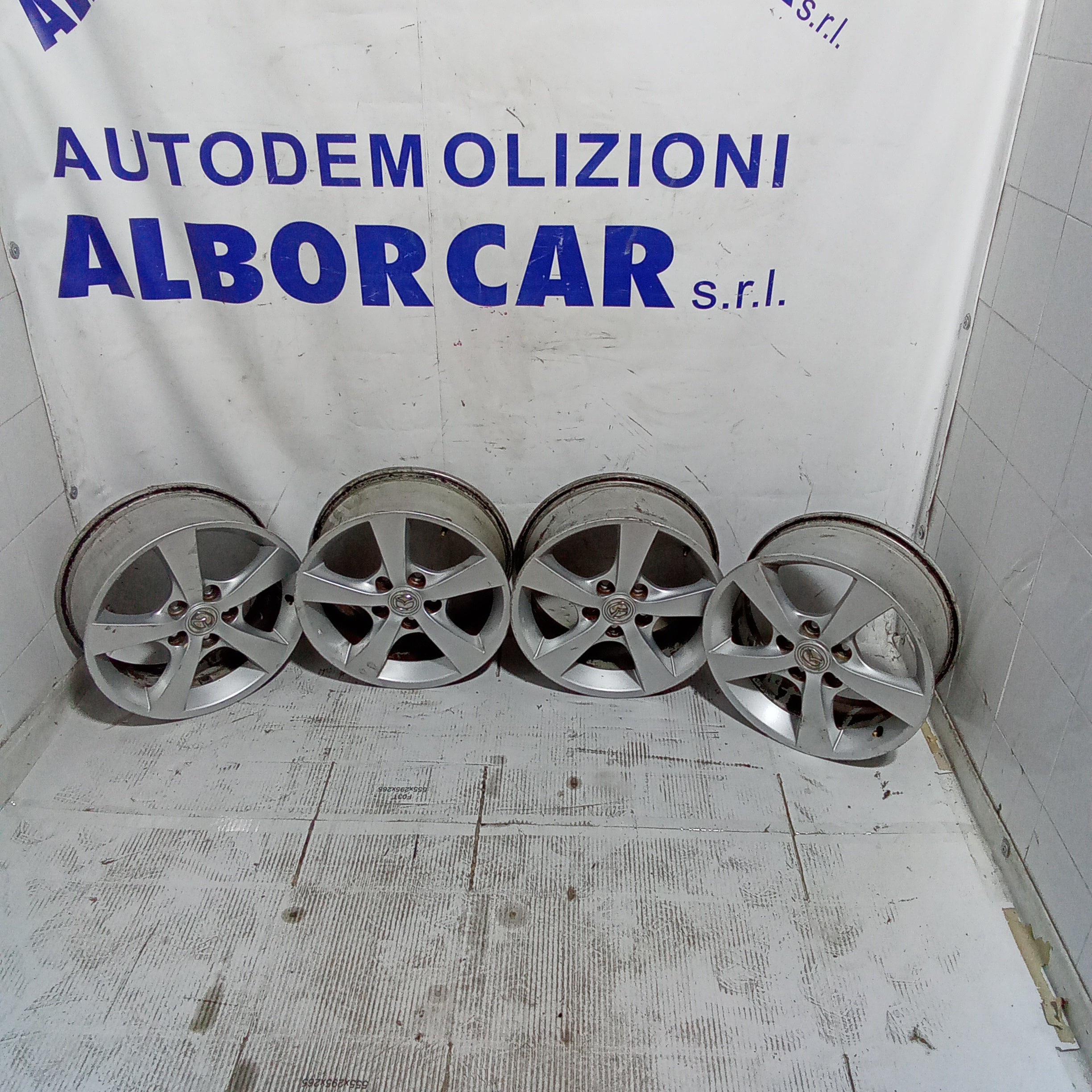 4 cerchi in lega mazda3  5 fori 16 pollici