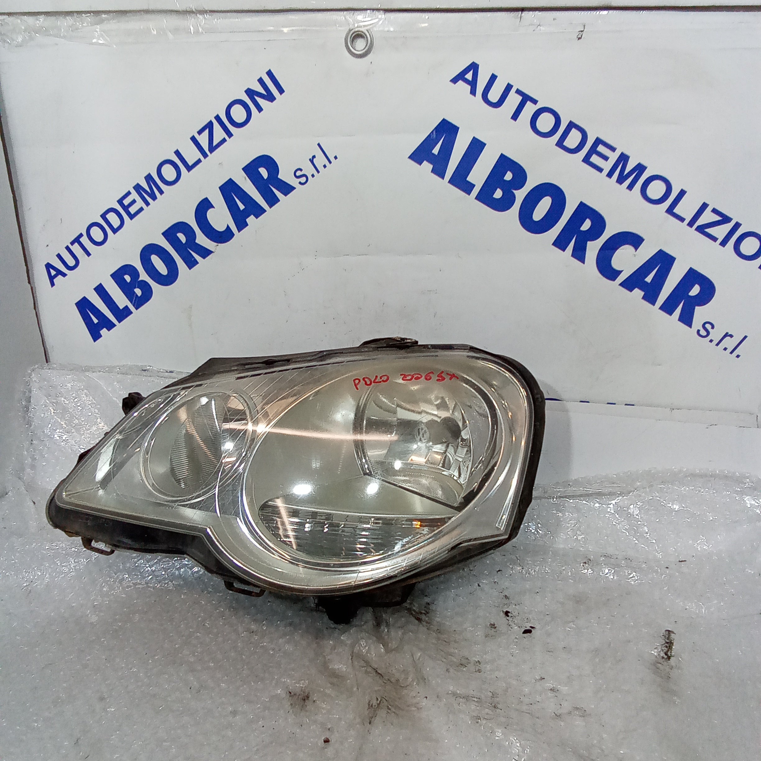 Left front headlight Volkswagen Polo year 2006