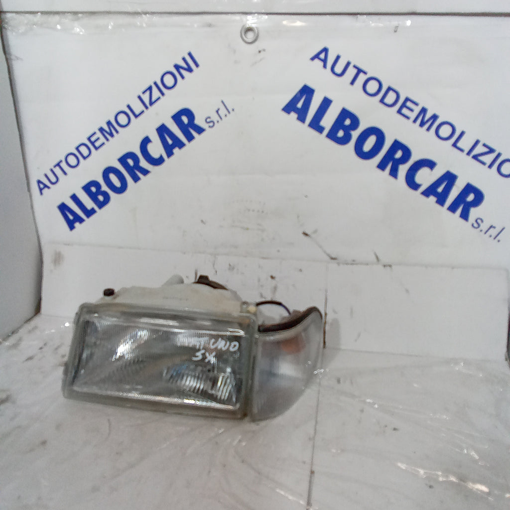Faro delantero izquierdo Fiat Uno año 1992