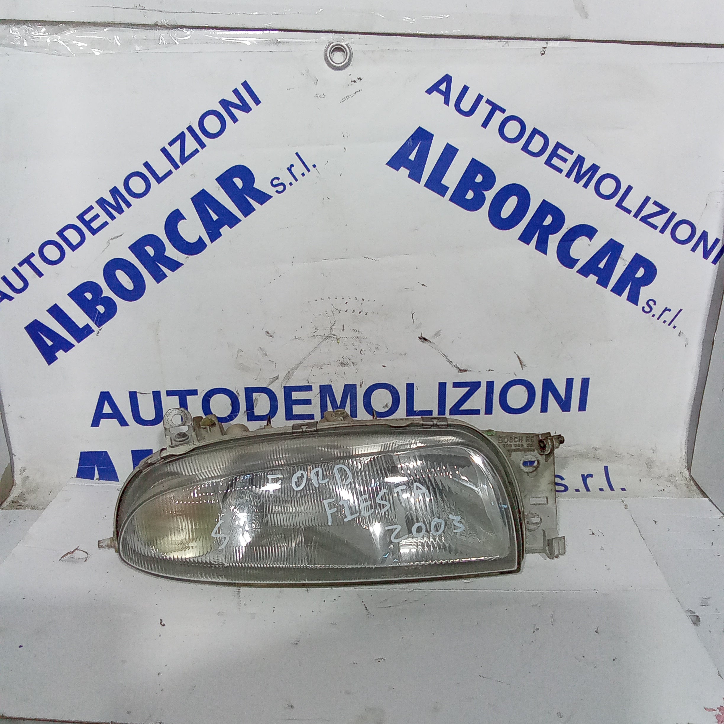 Faro delantero derecho Ford Fiesta año 2003