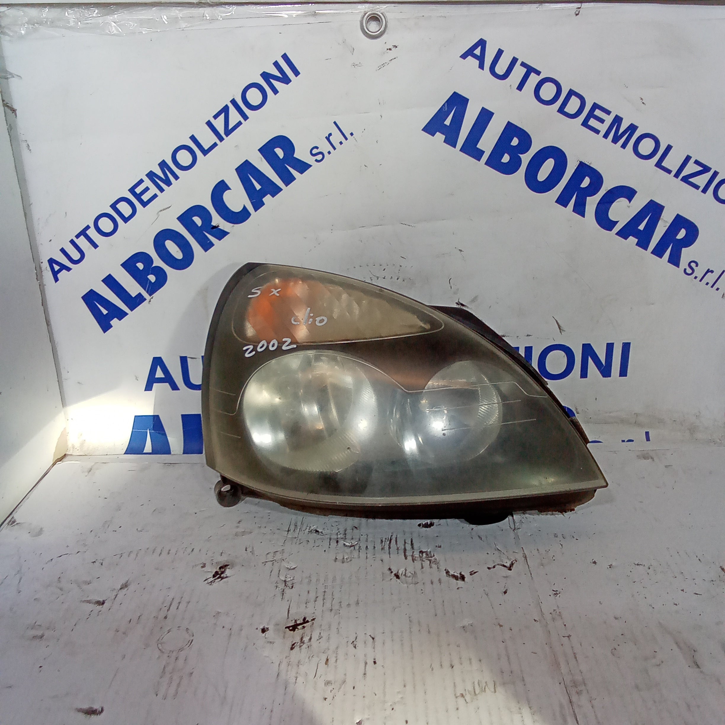Faro delantero izquierdo Renault Clio año 2002