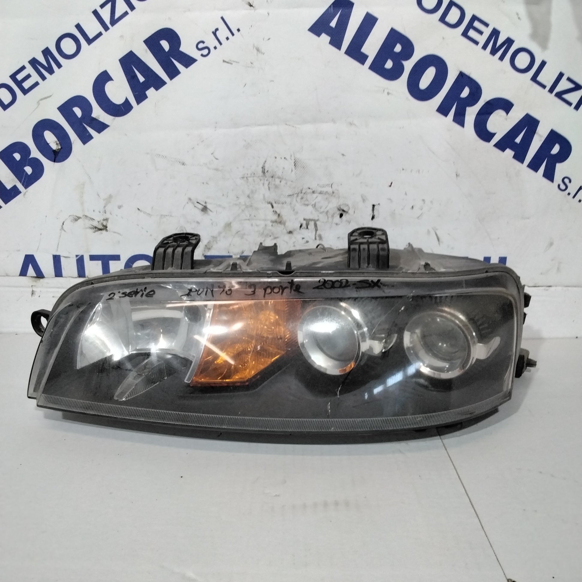 Faro/fanale sinistro punto 2 serie 3 porte 2002