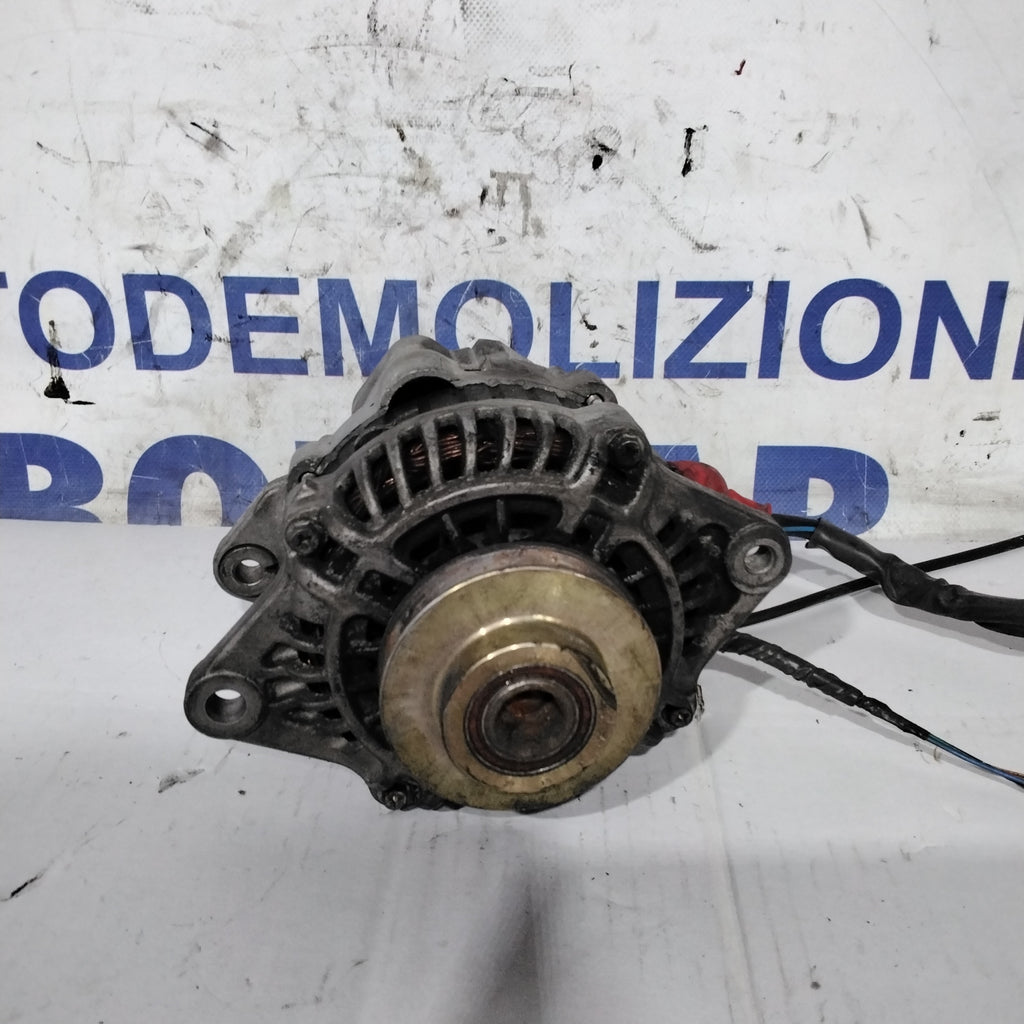 Alternador Nissan Primera código: 23100AD210