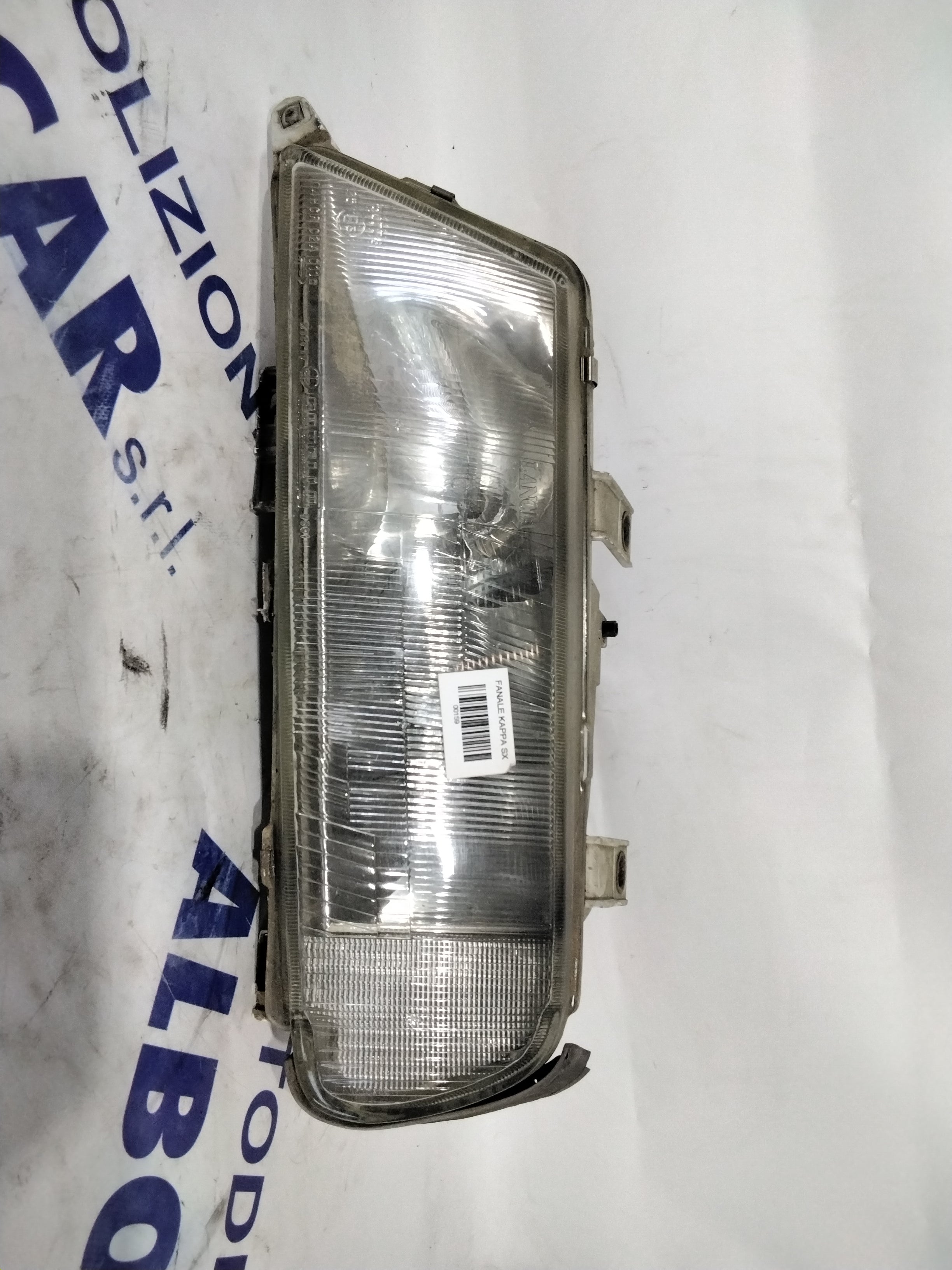 Lancia Kappa headlamp left year code: 36670748 (sf8p1)