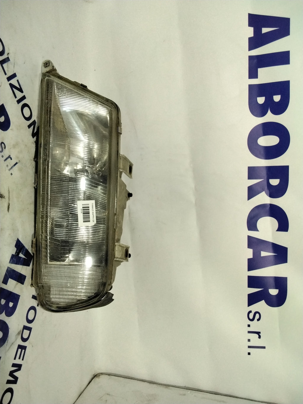 Lancia Kappa headlamp left year code: 36670748 (sf8p1)