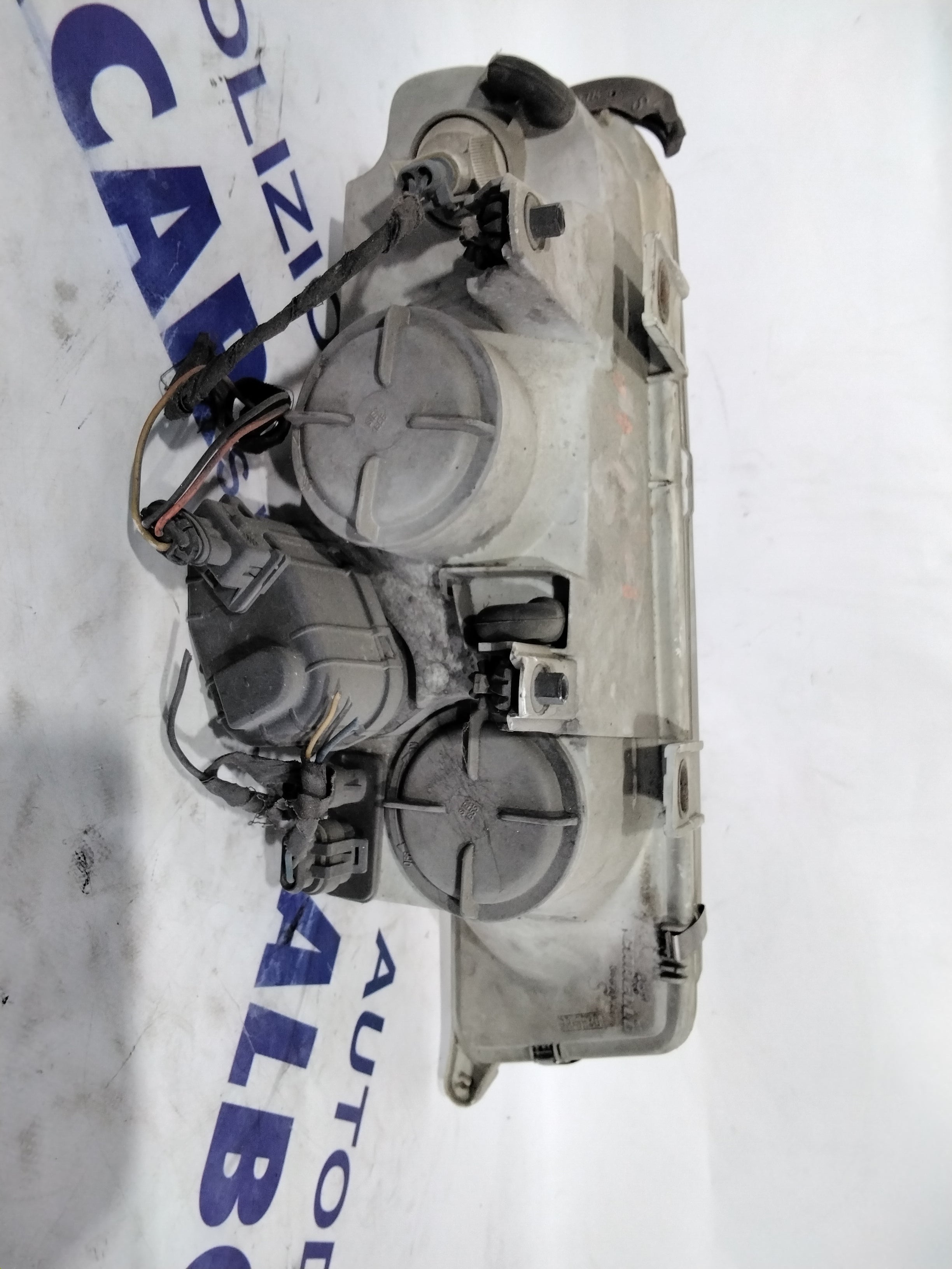 Lancia Kappa headlamp left year code: 36670748 (sf8p1)