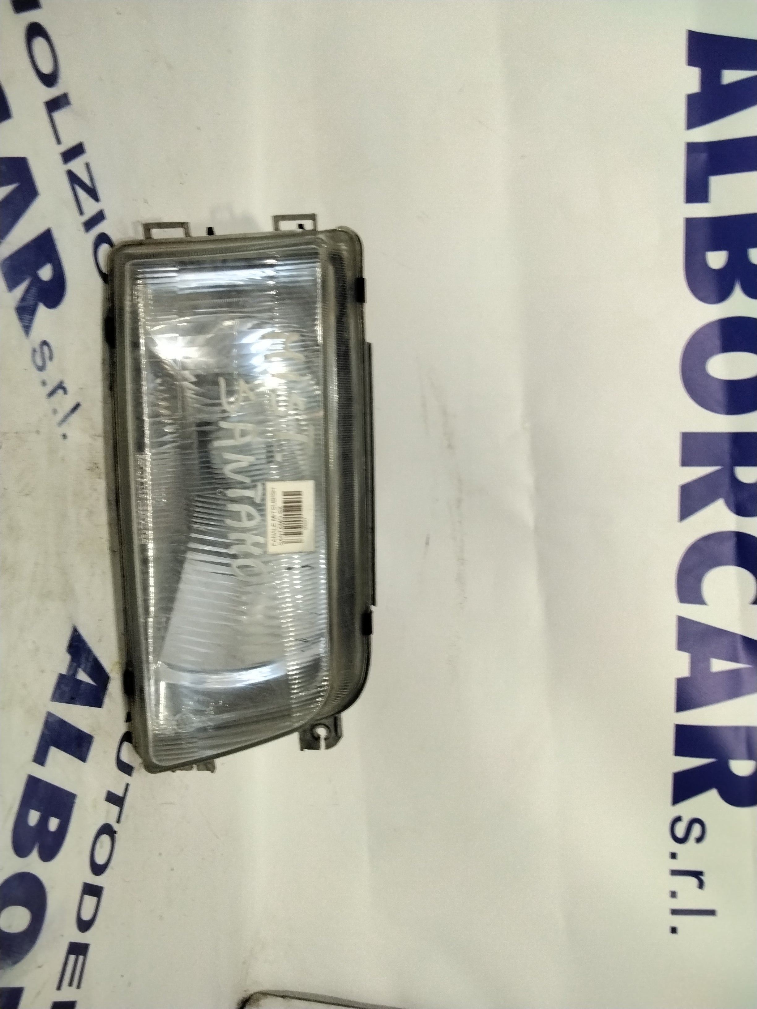 Headlight Mitsubishi Santamo left year 1996 (sf8p4)