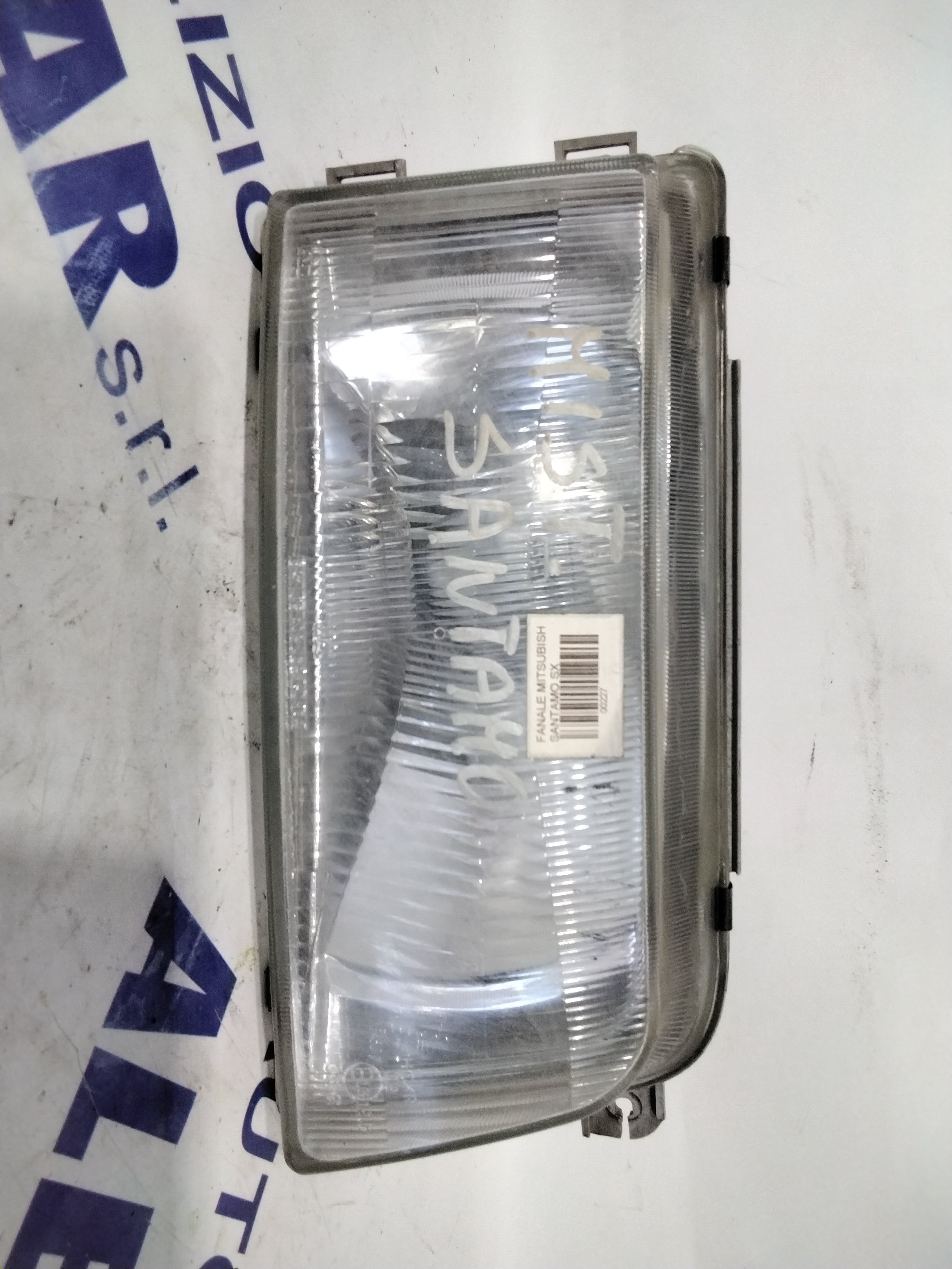 Headlight Mitsubishi Santamo left year 1996 (sf8p4)