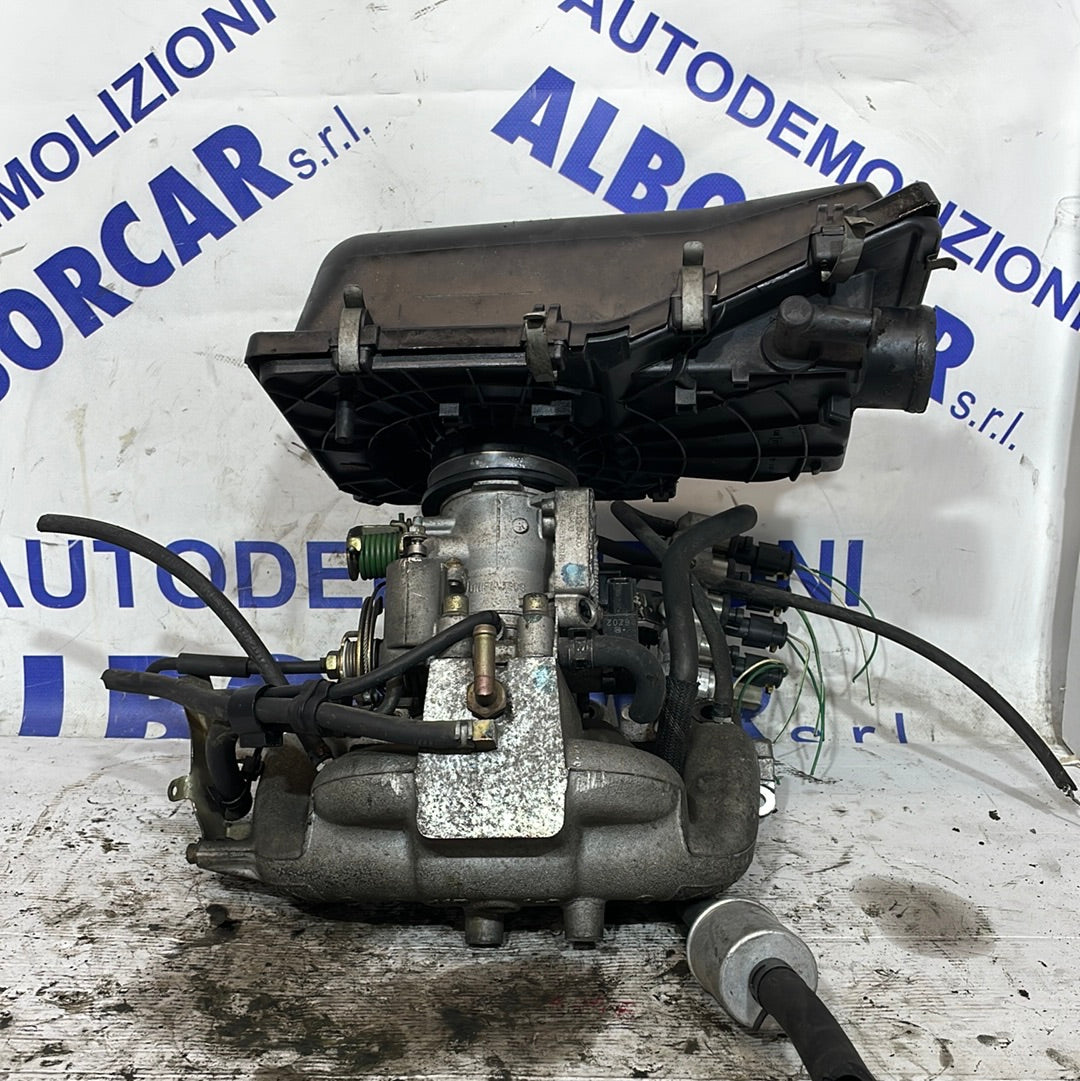 Corpo di aspirazione Nissan micra 1.0 anno 2003