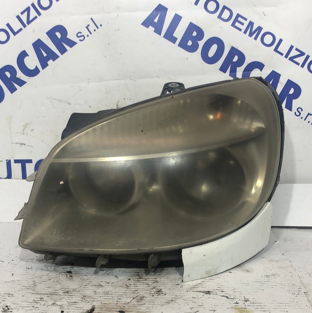 Faro/piloto Fiat Doblo año 2009 izquierdo